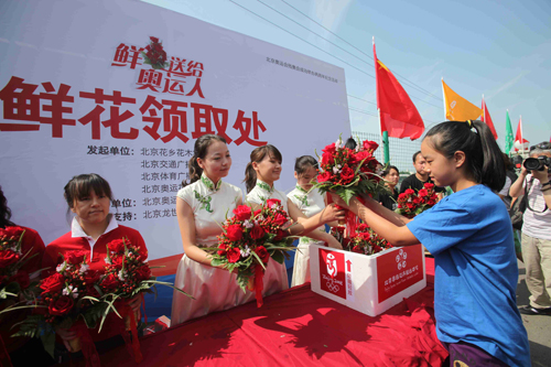 鲜花献给奥运人
